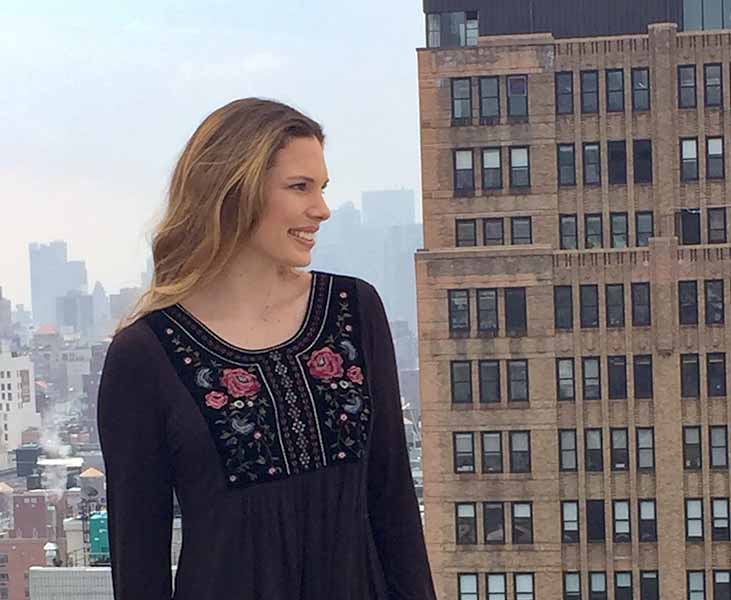 Woman on top of a building