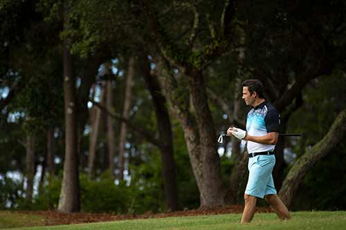 Man walking on golf field